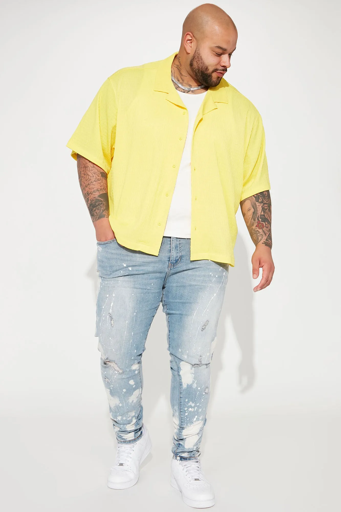 Bleach Spotted Ripped Knee Stacked Skinny Jeans - Light Wash