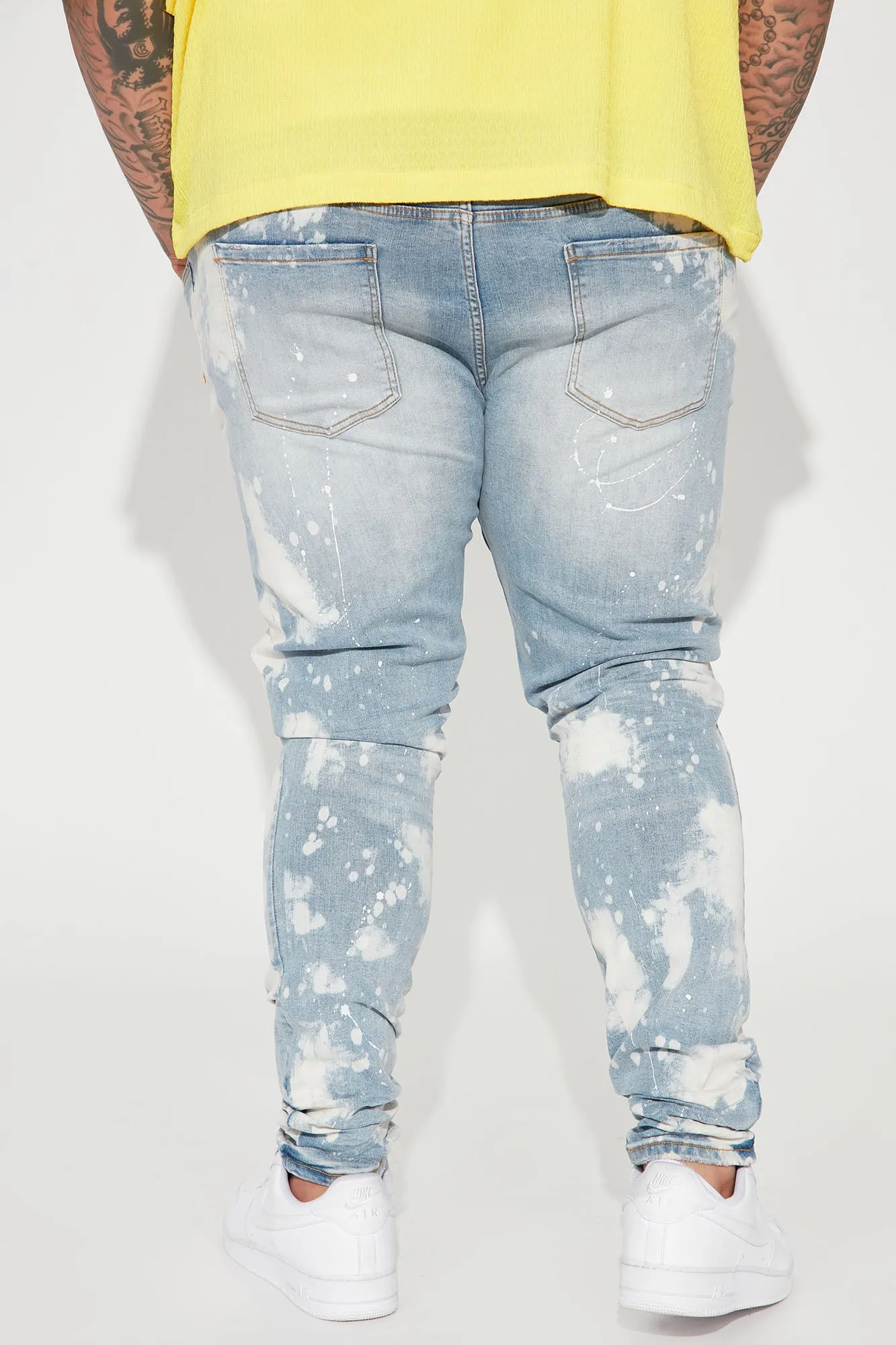 Bleach Spotted Ripped Knee Stacked Skinny Jeans - Light Wash