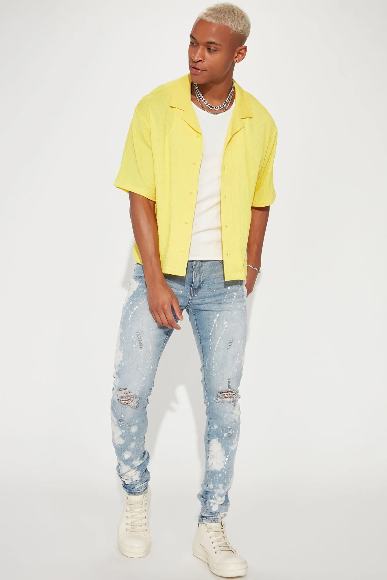 Bleach Spotted Ripped Knee Stacked Skinny Jeans - Light Wash