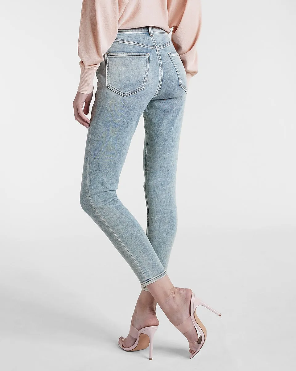 High Waisted Supersoft Knit Button Fly Ripped Skinny Jeans in Medium Wash